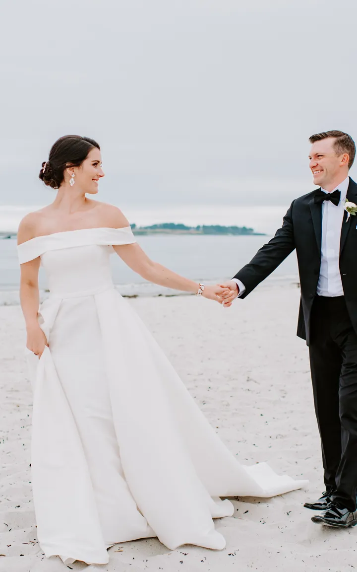 Sneak Peek Of Bride And Groom On Beach